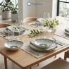 Set di piatti porcellana Corolla Verde apparecchiato su tavola conviviale